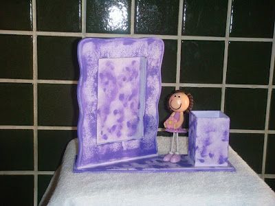 Porta-retrato com porta-trecos.