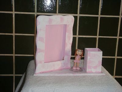 Porta-retrato com porta-trecos.